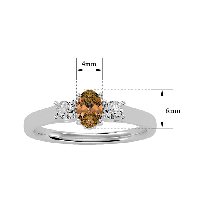 1/2 Carat Oval Shape Citrine and Two Diamond Ring In 14 Karat White Gold