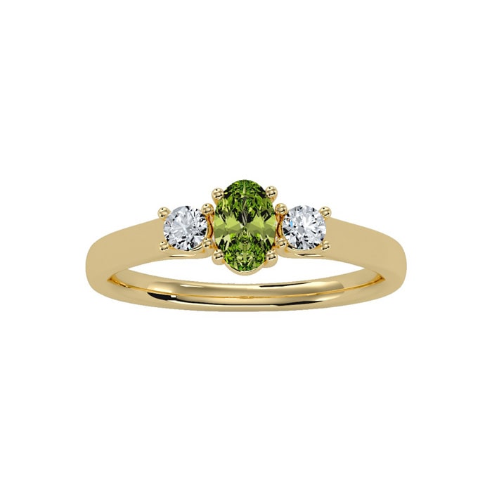 3/4 Carat Oval Shape Peridot and Two Diamond Ring In 14 Karat Yellow Gold