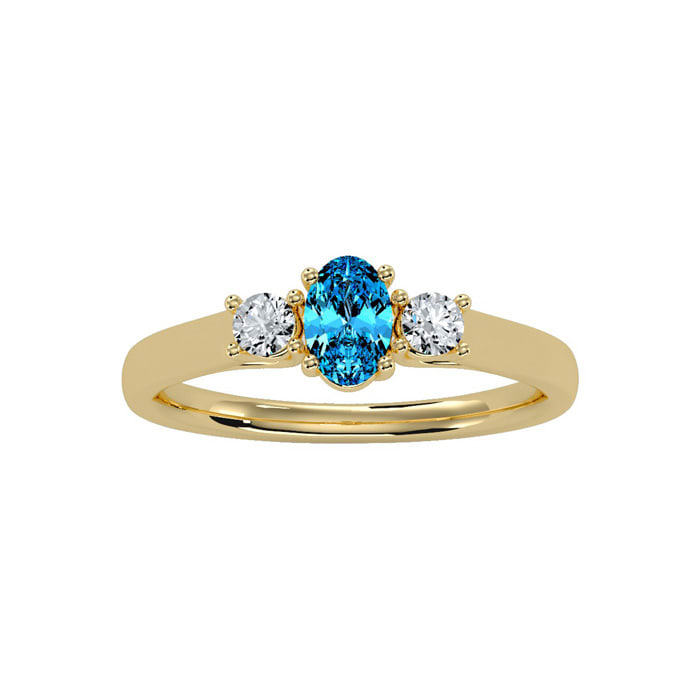3/4 Carat Oval Shape Blue Topaz and Two Diamond Ring In 14 Karat Yellow Gold