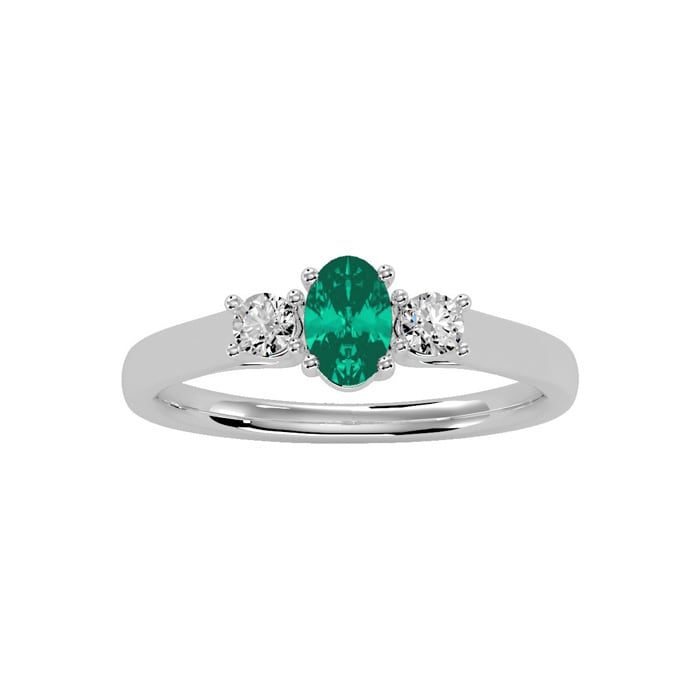 1/2 Carat Oval Shape Emerald and Two Diamond Ring In 14 Karat White Gold