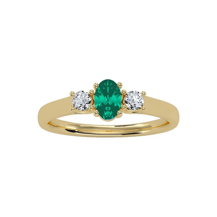 1/2 Carat Oval Shape Emerald and Two Diamond Ring In 14 Karat Yellow Gold