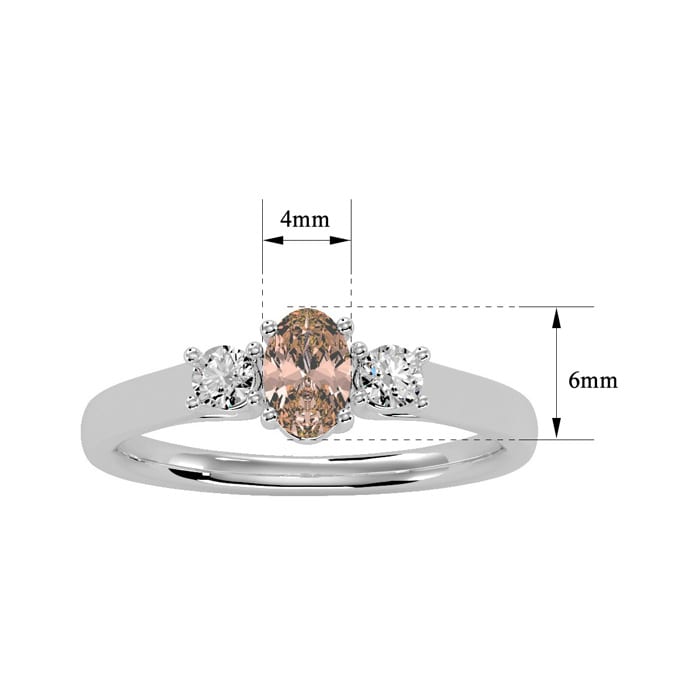 1/2 Carat Oval Shape Morganite and Two Diamond Ring In 14 Karat White Gold