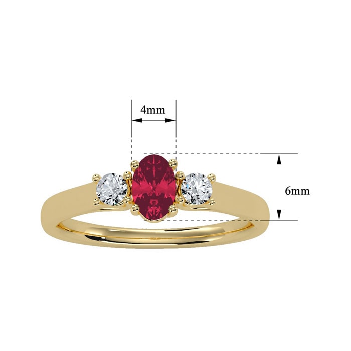 3/4 Carat Oval Shape Ruby and Two Diamond Ring In 14 Karat Yellow Gold