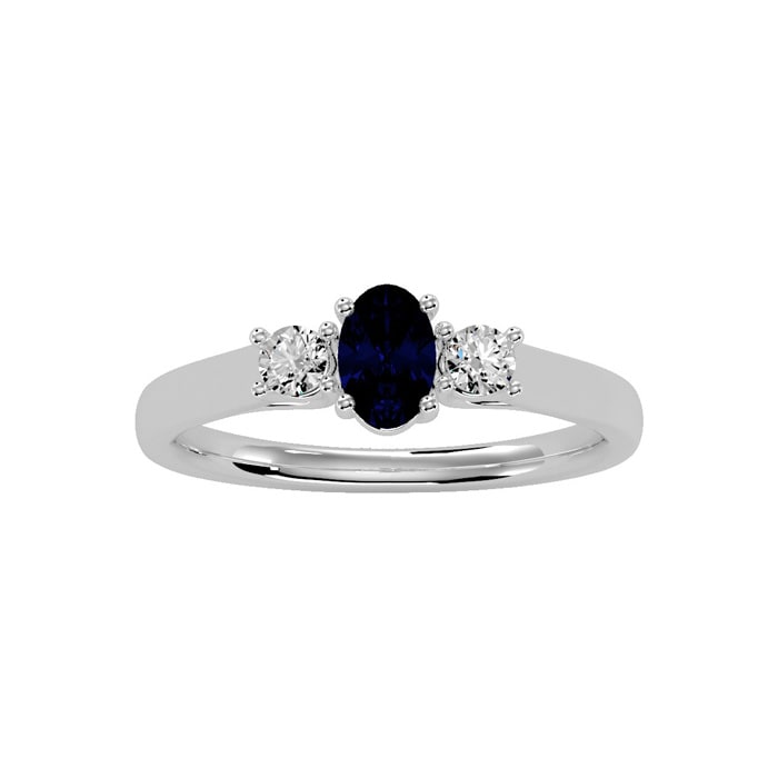 3/4 Carat Oval Shape Sapphire and Two Diamond Ring In 14 Karat White Gold