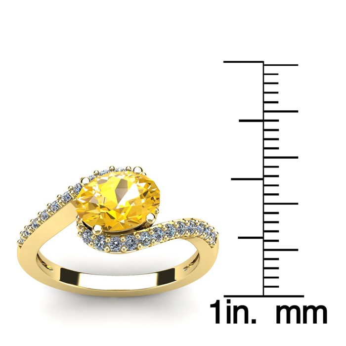 1 1/3 Carat Oval Shape Citrine and Halo Diamond Ring In 14 Karat Yellow Gold