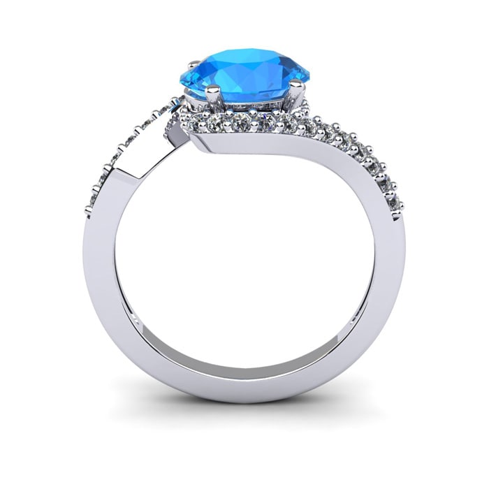 1 3/4 Carat Oval Shape Blue Topaz and Halo Diamond Ring In 14 Karat White Gold