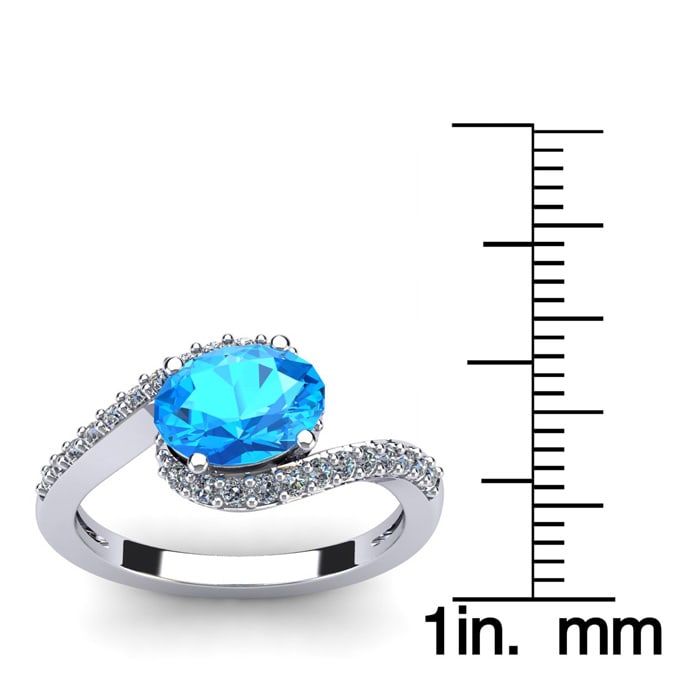 1 3/4 Carat Oval Shape Blue Topaz and Halo Diamond Ring In 14 Karat White Gold