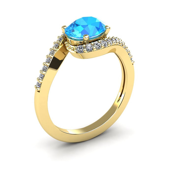 1 3/4 Carat Oval Shape Blue Topaz and Halo Diamond Ring In 14 Karat Yellow Gold