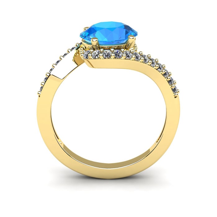 1 3/4 Carat Oval Shape Blue Topaz and Halo Diamond Ring In 14 Karat Yellow Gold