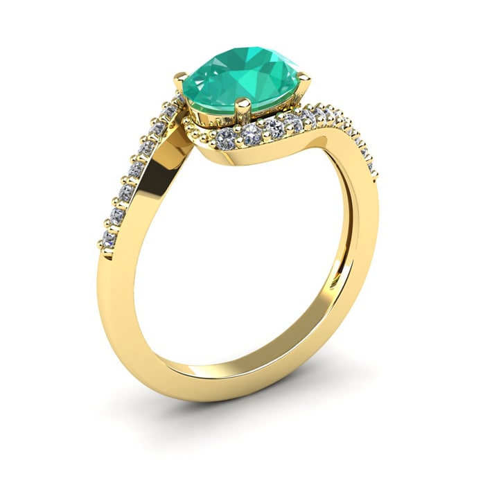 1 1/2 Carat Oval Shape Emerald and Halo Diamond Ring In 14 Karat Yellow Gold