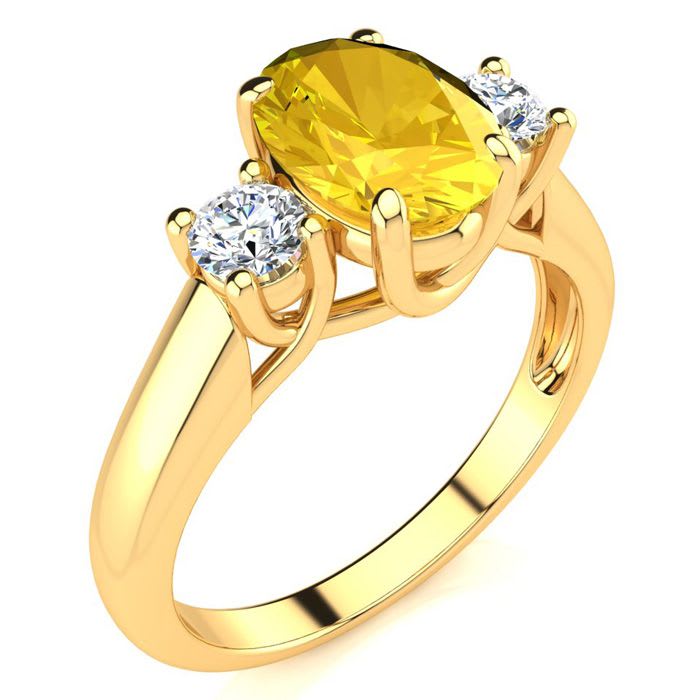 1 1/4 Carat Oval Shape Citrine and Two Diamond Ring In 14 Karat Yellow Gold