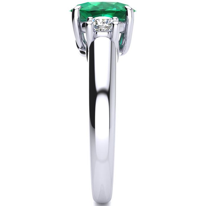 1 1/3 Carat Oval Shape Emerald and Two Diamond Ring In 14 Karat White Gold
