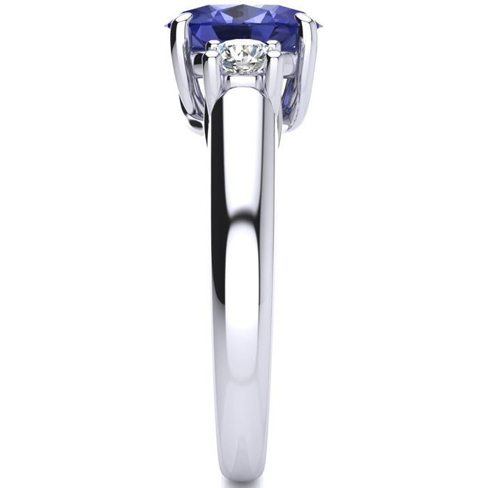 1 1/2 Carat Oval Shape Tanzanite and Two Diamond Ring In 14 Karat White Gold