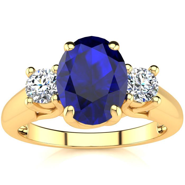 1 3/4 Carat Oval Shape Sapphire and Two Diamond Ring In 14 Karat Yellow Gold
