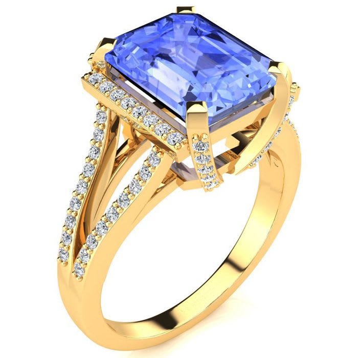 4 Carat Tanzanite and Halo Diamond Ring In 14 Karat Yellow Gold
