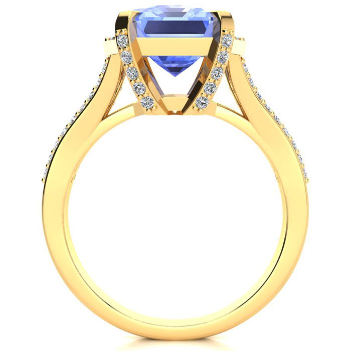 4 Carat Tanzanite and Halo Diamond Ring In 14 Karat Yellow Gold
