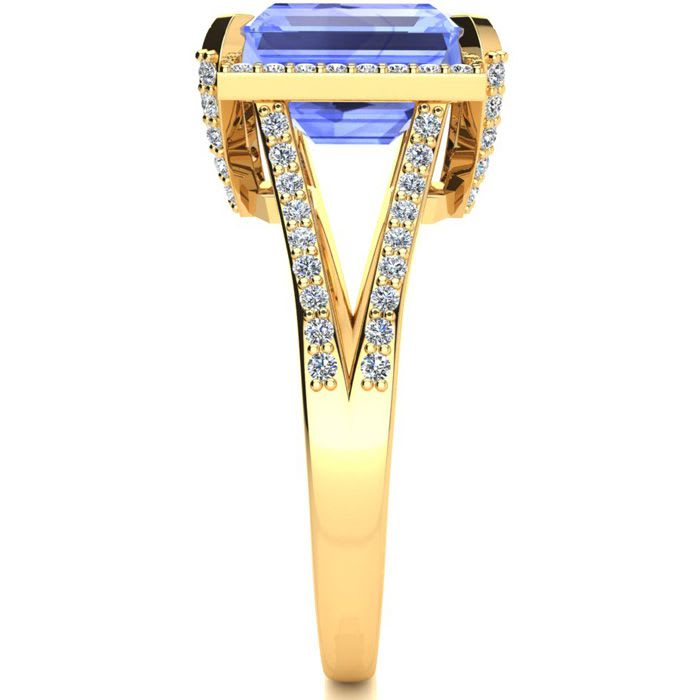 4 Carat Tanzanite and Halo Diamond Ring In 14 Karat Yellow Gold

