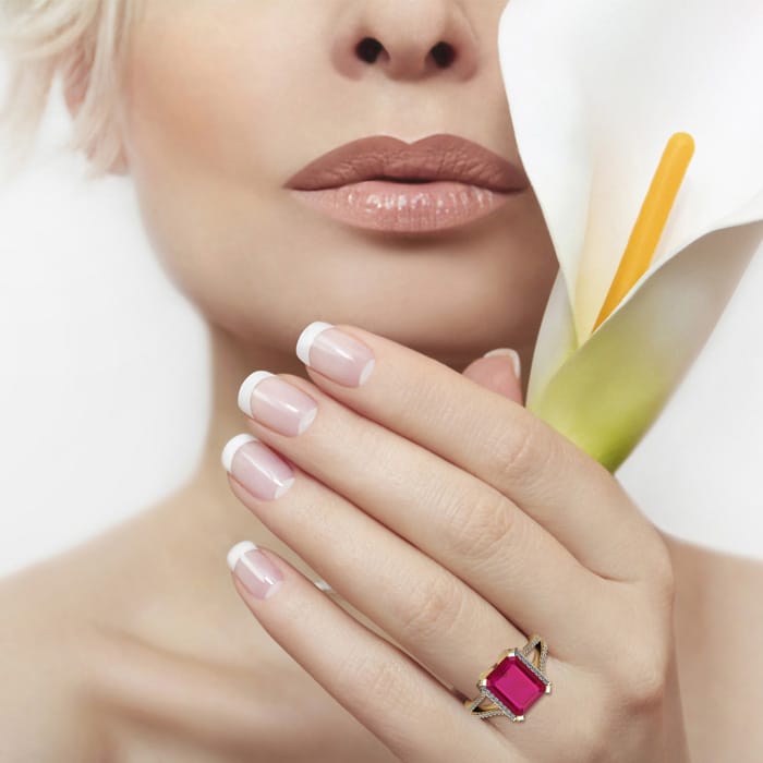 4 Carat Ruby and Halo Diamond Ring In 14 Karat Yellow Gold