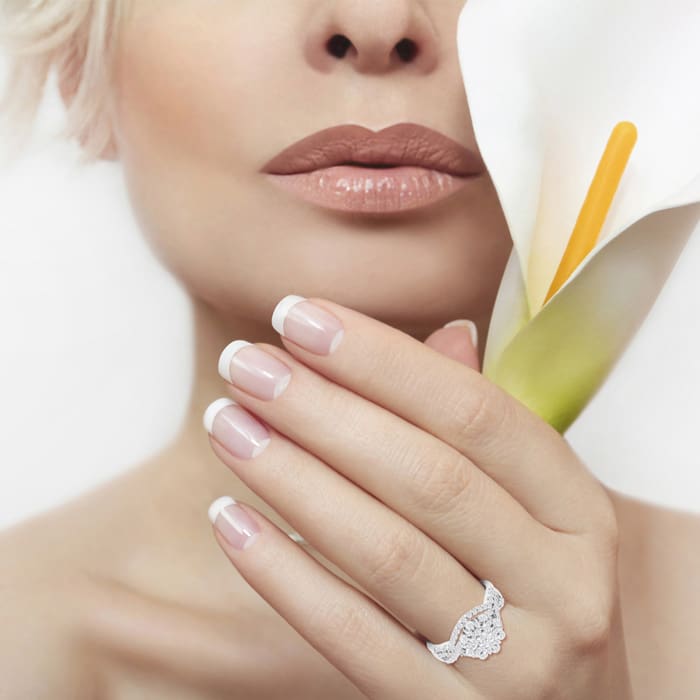 3/4 Carat Floral Halo Diamond Bridal Set in 14 Karat White Gold