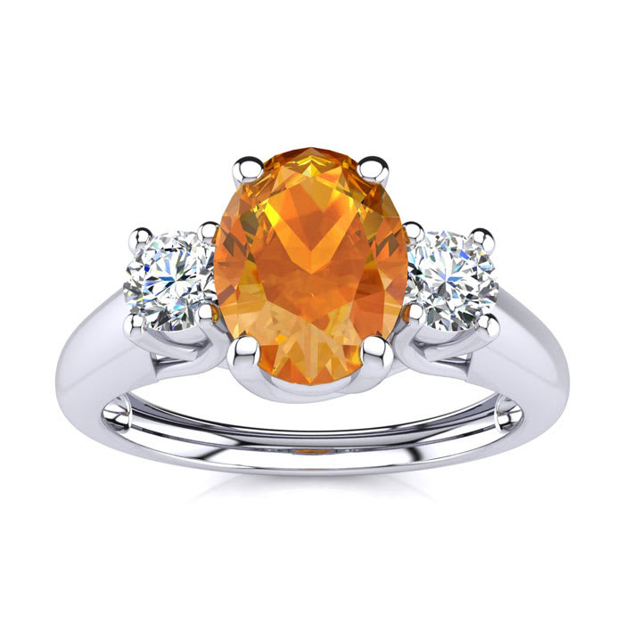 1 Carat Oval Shape Citrine and Two Diamond Ring In 14 Karat White Gold