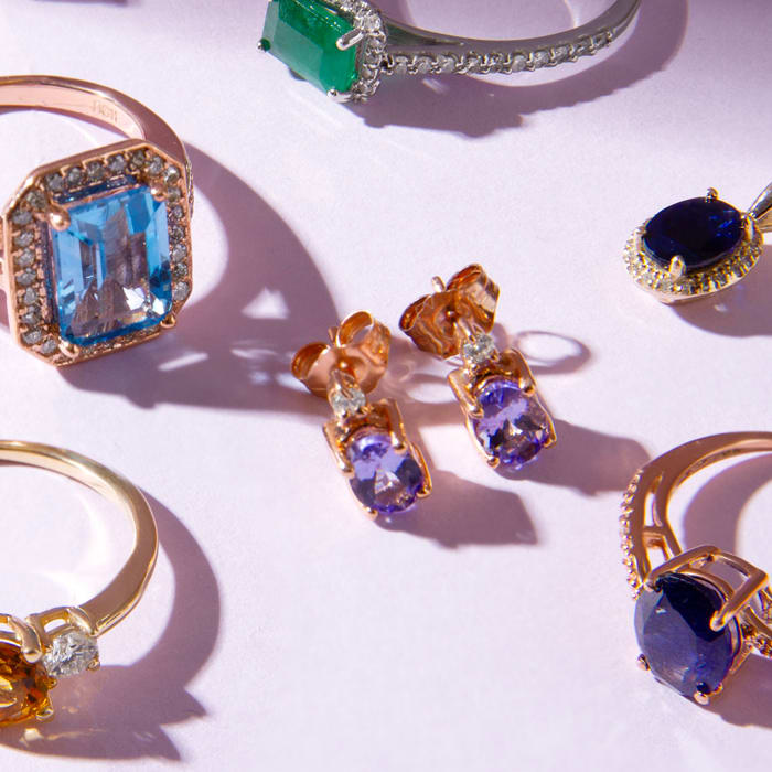 1 Carat Oval Shape Citrine and Two Diamond Ring In 14 Karat Yellow Gold