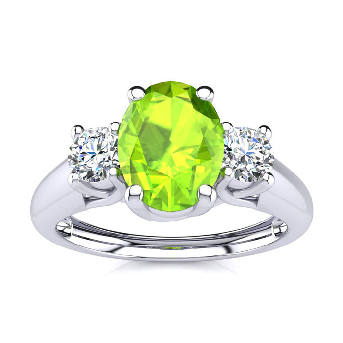 1 Carat Oval Shape Peridot and Two Diamond Ring In 14 Karat White Gold