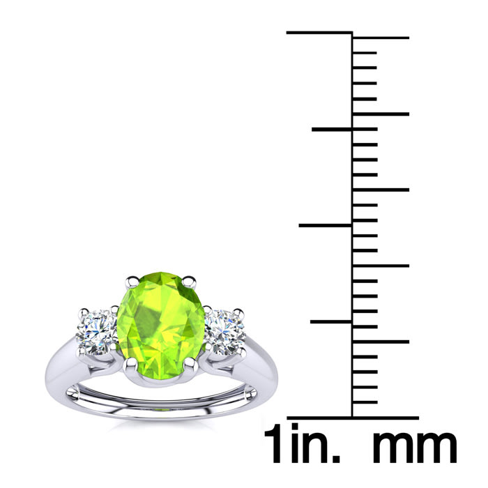 1 Carat Oval Shape Peridot and Two Diamond Ring In 14 Karat White Gold