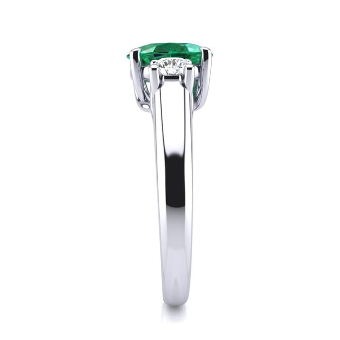 1 Carat Oval Shape Emerald and Two Diamond Ring In 14 Karat White Gold