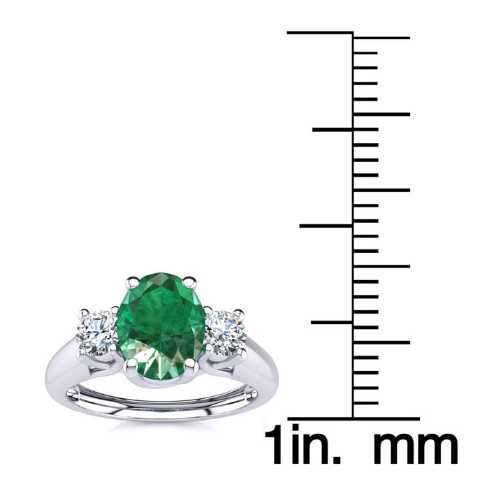 1 Carat Oval Shape Emerald and Two Diamond Ring In 14 Karat White Gold