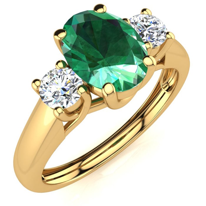 1 Carat Oval Shape Emerald and Two Diamond Ring In 14 Karat Yellow Gold