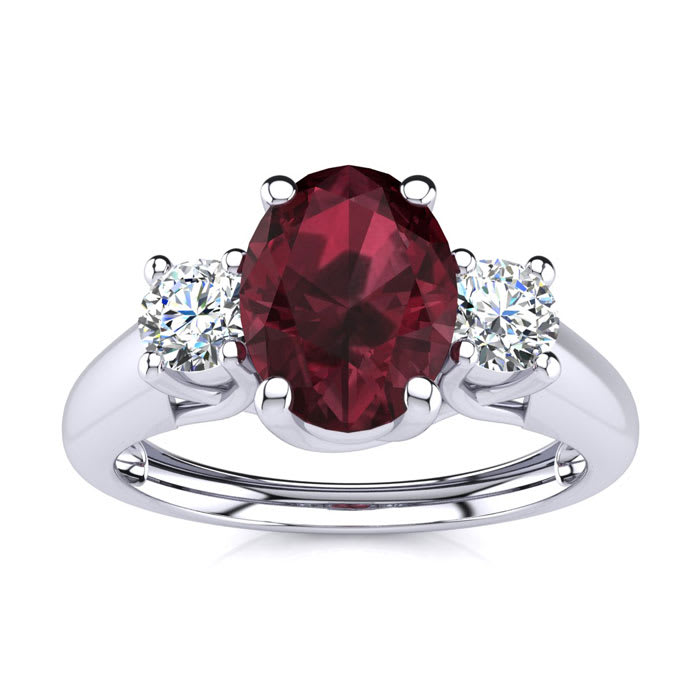 Garnet Ring: Garnet Jewelry: 1 1/5 Carat Oval Shape Garnet and Two Diamond Ring In 14 Karat White Gold