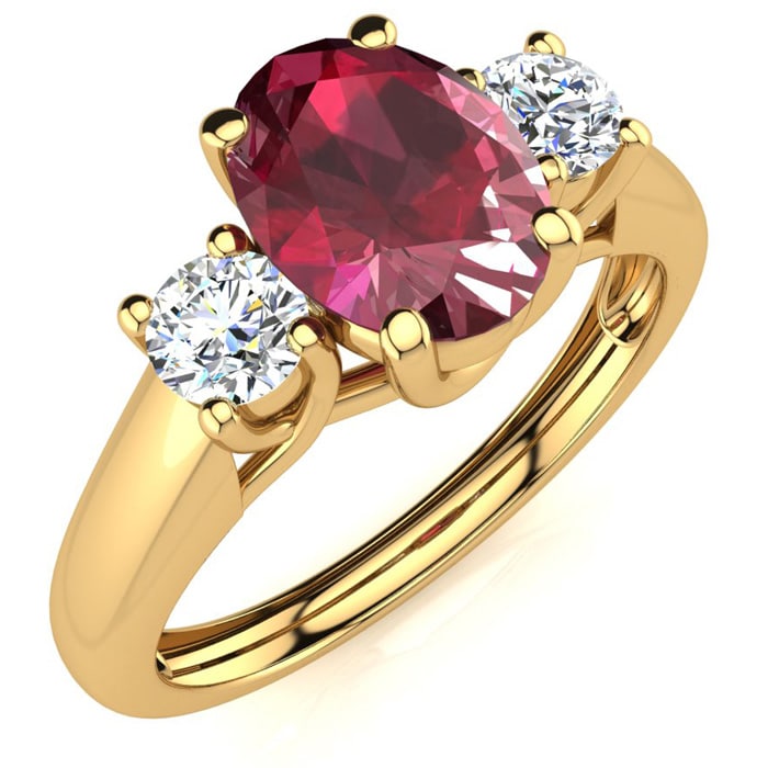 1.15 Carat Oval Shape Ruby and Two Diamond Ring In 14 Karat Yellow Gold