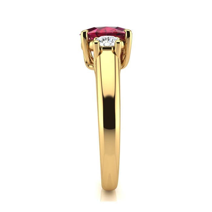 1.15 Carat Oval Shape Ruby and Two Diamond Ring In 14 Karat Yellow Gold