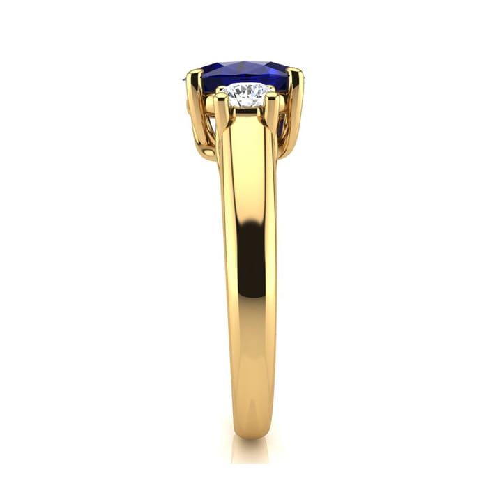 1 1/5 Carat Oval Shape Sapphire and Two Diamond Ring In 14 Karat Yellow Gold