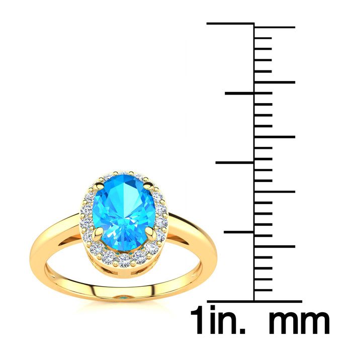 1 Carat Oval Shape Blue Topaz and Halo Diamond Ring In 14K Yellow Gold