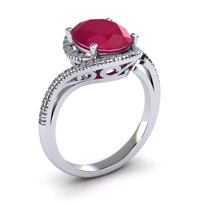 1 1/4 Carat Oval Shape Ruby and Halo Diamond Ring In 14 Karat White Gold