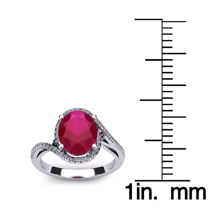 1 1/4 Carat Oval Shape Ruby and Halo Diamond Ring In 14 Karat White Gold