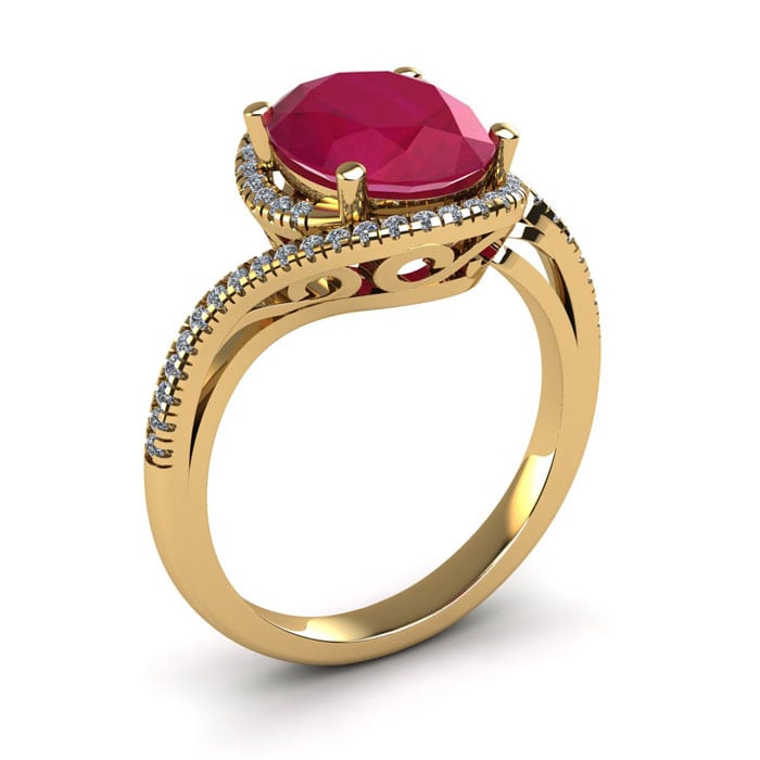 1 1/4 Carat Oval Shape Ruby and Halo Diamond Ring In 14 Karat Yellow Gold