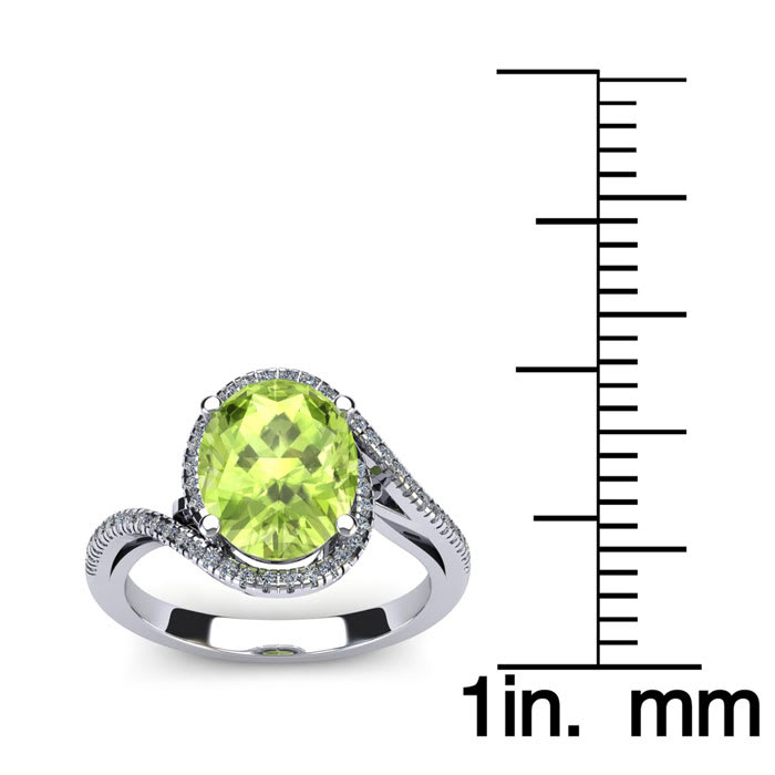 1 1/2 Carat Oval Shape Peridot and Halo Diamond Ring In 14 Karat White Gold