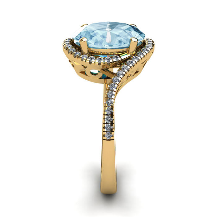 Aquamarine Ring: Aquamarine Jewelry: 1 1/3 Carat Oval Shape Aquamarine and Halo Diamond Ring In 14 Karat Yellow Gold