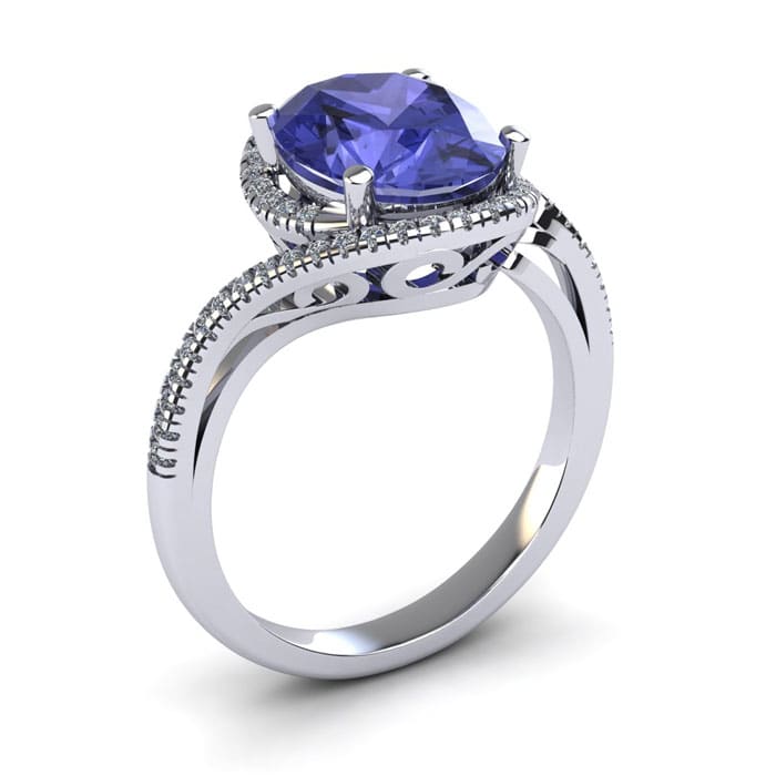 1 1/2 Carat Oval Shape Tanzanite and Halo Diamond Ring In 14 Karat White Gold