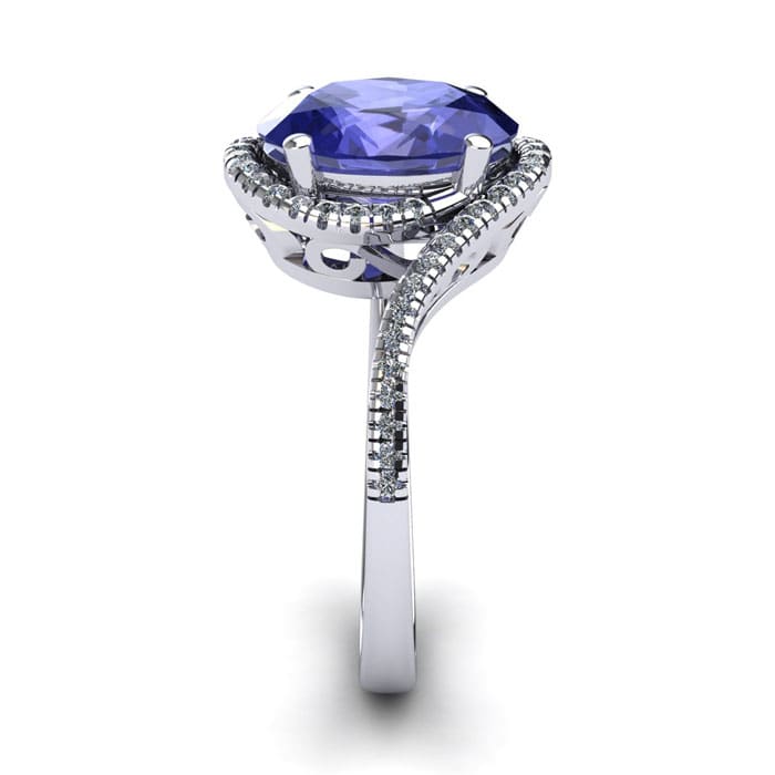 1 1/2 Carat Oval Shape Tanzanite and Halo Diamond Ring In 14 Karat White Gold