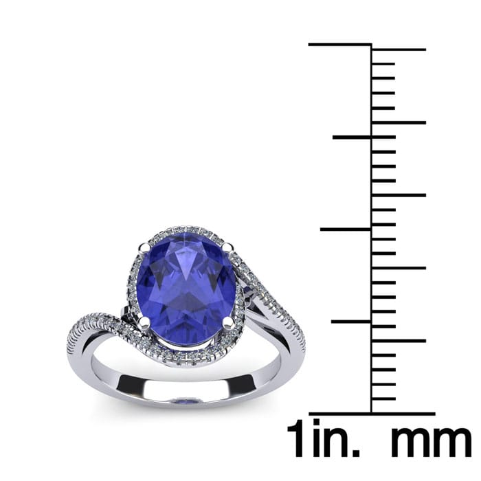 1 1/2 Carat Oval Shape Tanzanite and Halo Diamond Ring In 14 Karat White Gold