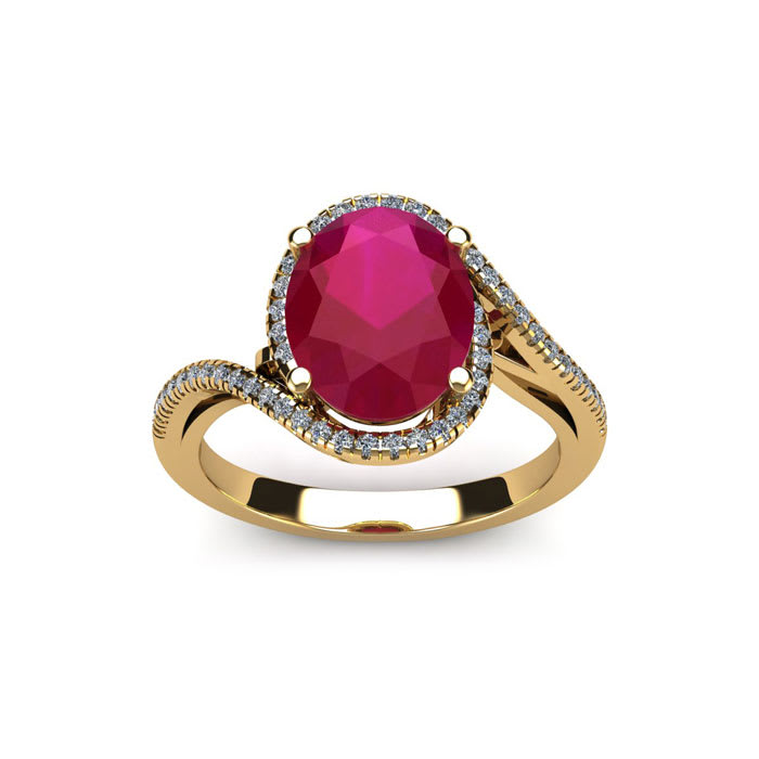 1 3/4 Carat Oval Shape Ruby and Halo Diamond Ring In 14 Karat Yellow Gold