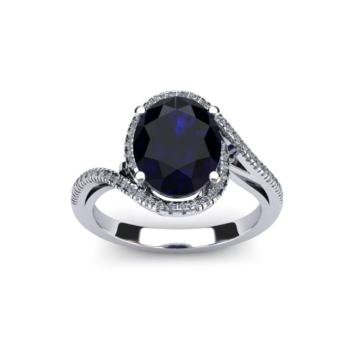 1 3/4 Carat Oval Shape Sapphire and Halo Diamond Ring In 14 Karat White Gold