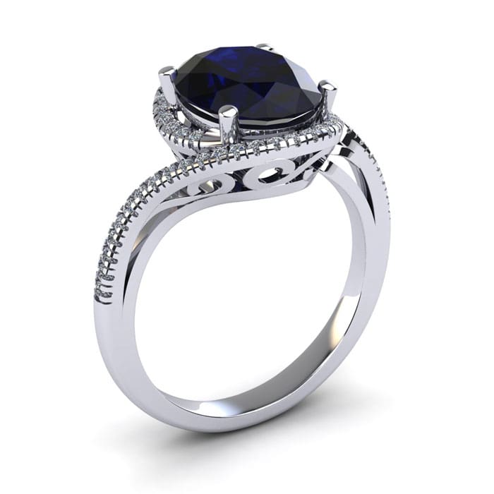 1 3/4 Carat Oval Shape Sapphire and Halo Diamond Ring In 14 Karat White Gold