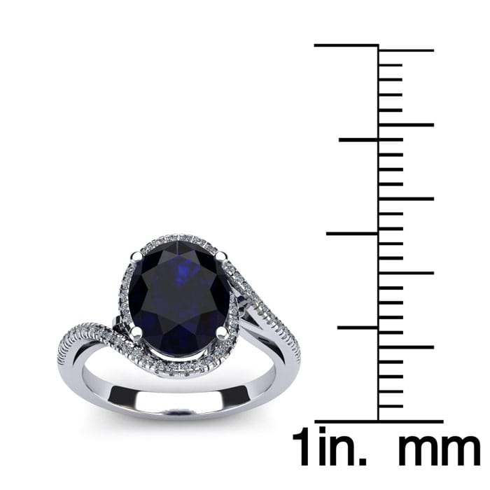 1 3/4 Carat Oval Shape Sapphire and Halo Diamond Ring In 14 Karat White Gold
