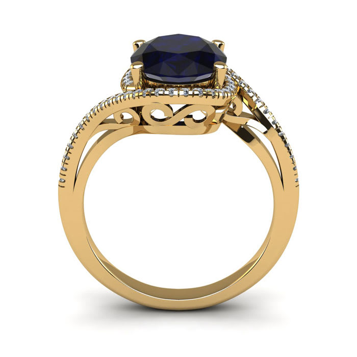 1 3/4 Carat Oval Shape Sapphire and Halo Diamond Ring In 14 Karat Yellow Gold