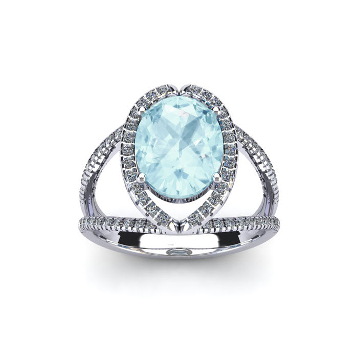 Aquamarine Ring: Aquamarine Jewelry: 1 1/2 Carat Oval Shape Aquamarine and Halo Diamond Ring In 14 Karat White Gold
