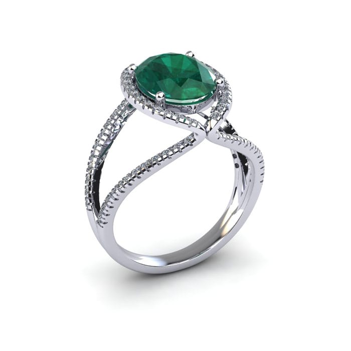 1 1/2 Carat Oval Shape Emerald and Halo Diamond Ring In 14 Karat White Gold
